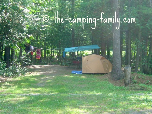 https://www.thecampingfamily.com/images/campsitewithorangetent.jpg