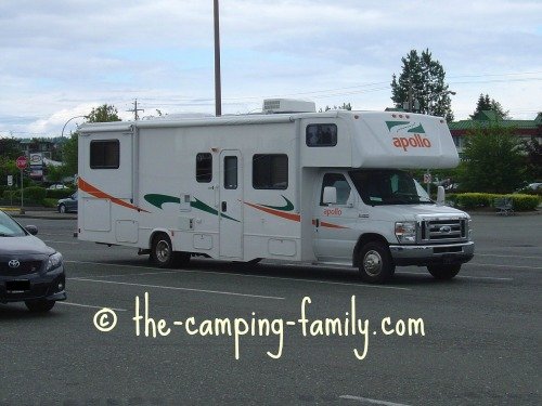 large motorhome in mall parking lot